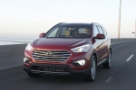 2014 Hyundai Santa Fe in Regal Red Pearl - Driving Front Left View